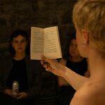 Engaging poetry reading session with close audience interaction in a warm, cozy ambiance.