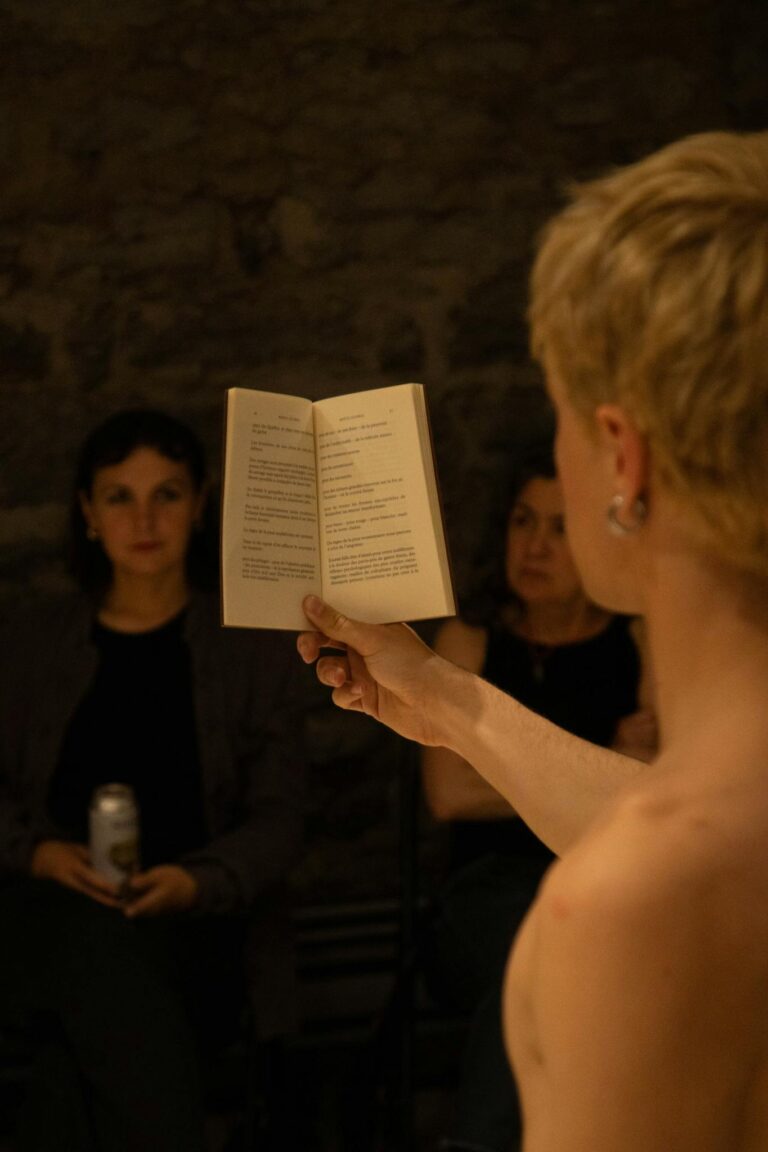 Engaging poetry reading session with close audience interaction in a warm, cozy ambiance.